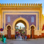 10-day Grand Morocco desert tour from Fes with camel trekking in Merzouga, Sahara camp overnight, Atlas Mountains, Todra Gorge, Dades Valley, and Ait Ben Haddou.